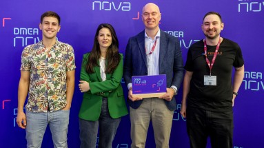 The finalists of the DMEA nova Award, three men and one woman in front of a wall with the DMEA nova branding 