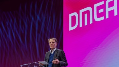 Federal Minister of Health Prof. Dr. Karl Lauterbach on a stage at DMEA 2025. 